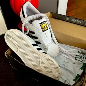 Men’s black and white leather adidas size 10 1/2